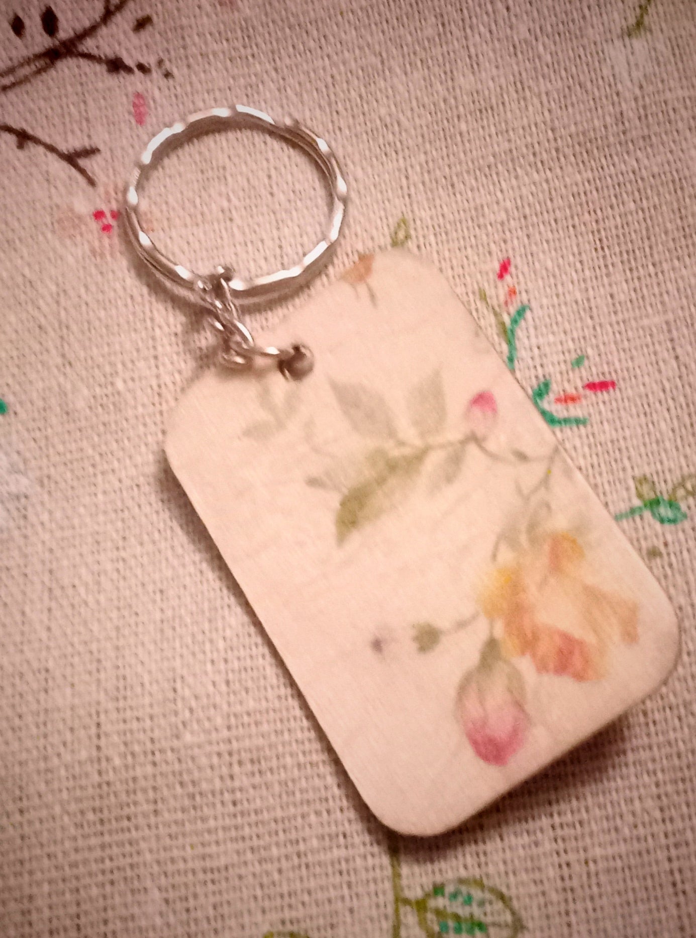 Rose quartz flower keyring in wildflower hessian bag