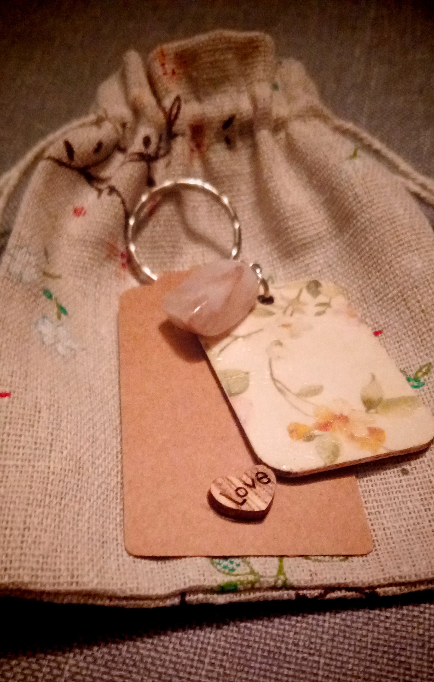 Rose quartz flower keyring in wildflower hessian bag