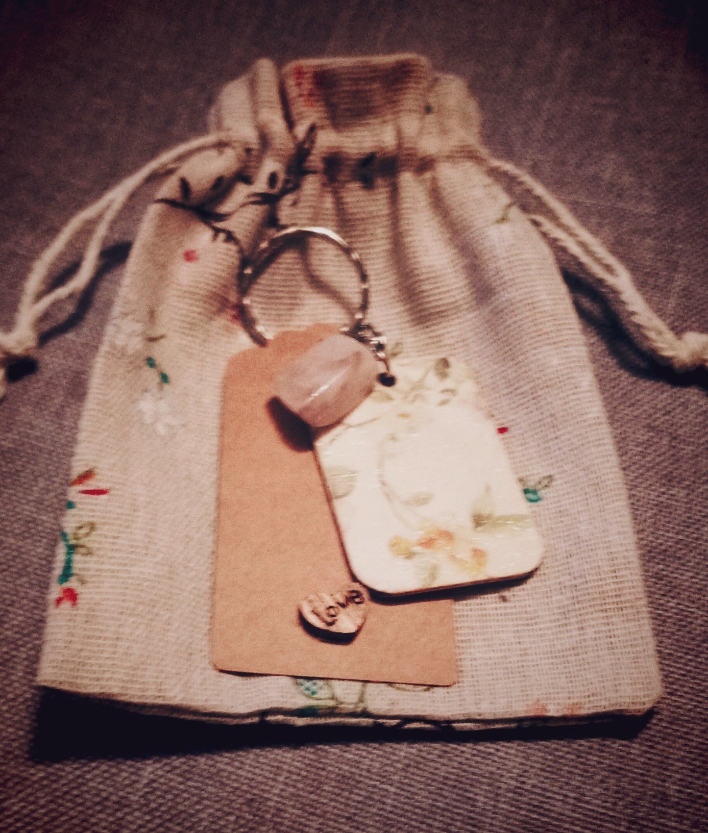 Rose quartz flower keyring in wildflower hessian bag